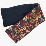 whiffy 5" x 23" microwavable neck wrap in black floral fabric with black flannel on the other side