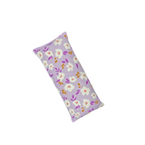 microwavable heating pad or eye pillow in a pretty lilac floral fabric